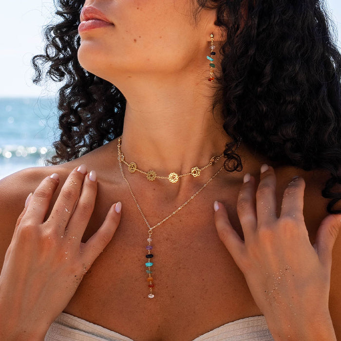 7 Chakras Raw Stone Healing Necklace, worn at the beach