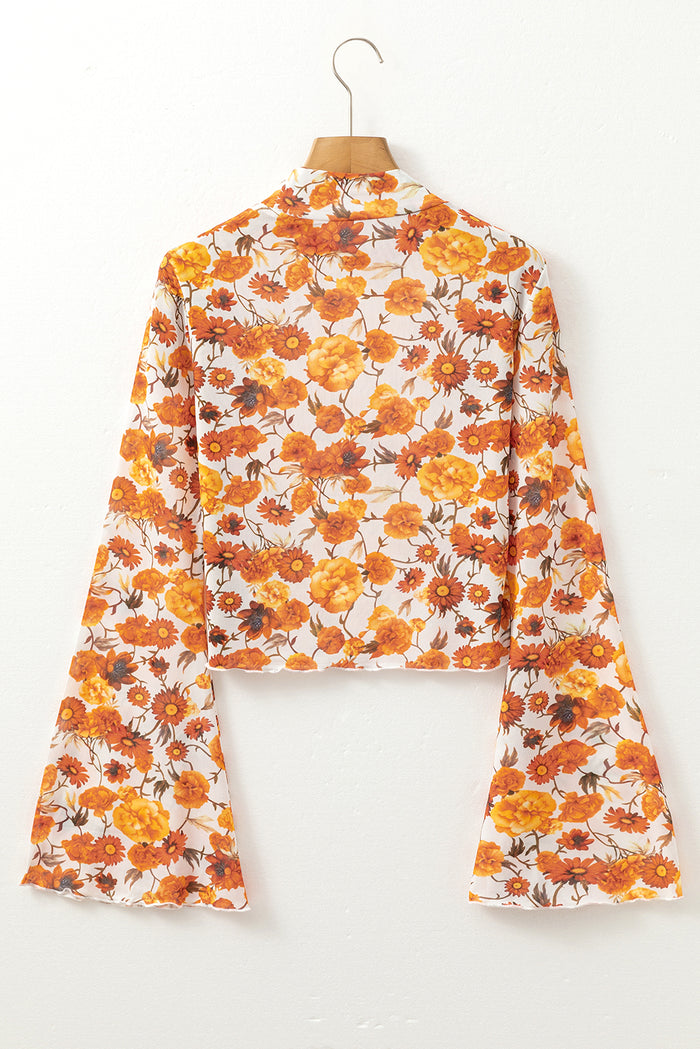 Chemisier orange à imprimé floral et manches cloche, col montant, bordure festonnée-A WOMAN WE LOVE