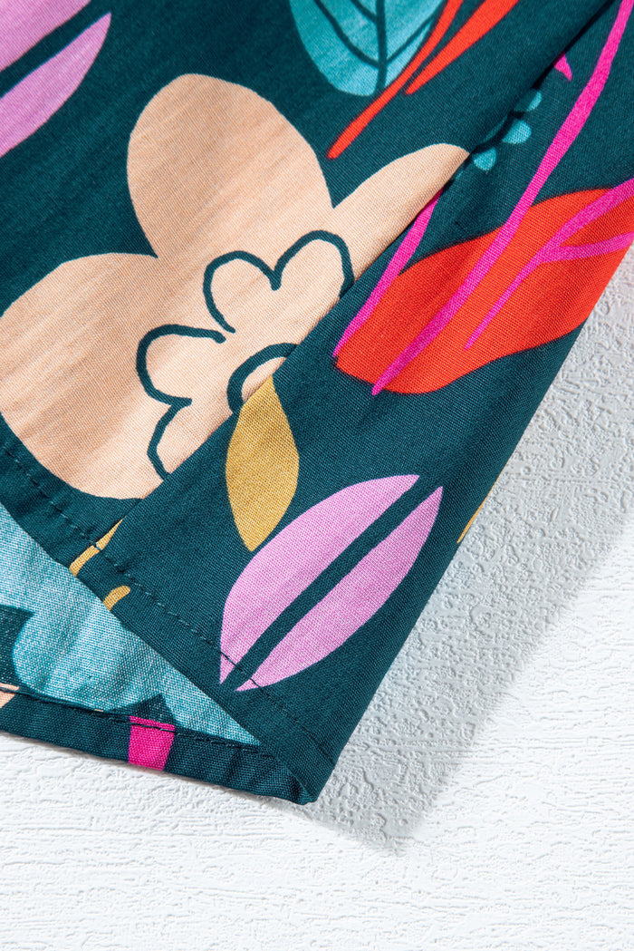 Chemisier vert à imprimé floral, manches bouffantes, noué à col en V-A WOMAN WE LOVE