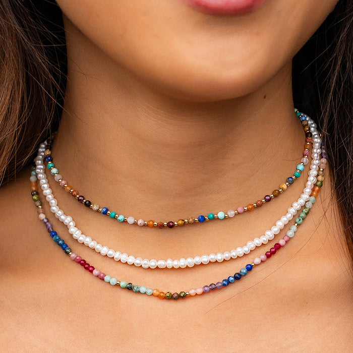 Good Vibes 3mm Healing Necklace, layered on neck