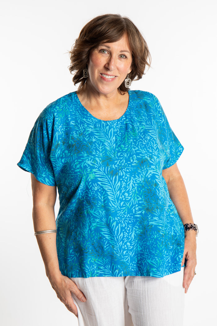 Betty is wearing a size Large batik tunic in Pacific