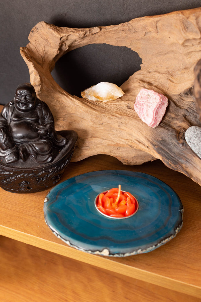 Polished agate tea light holders in teal