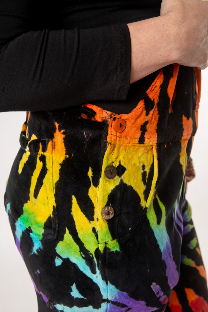 Margaret is wearing size M velour tie dye overalls