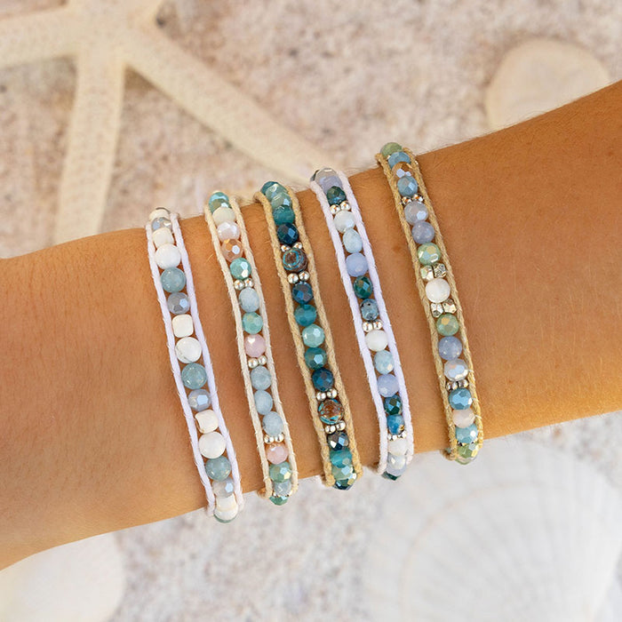 Sapphire Surf Healing Bracelet, stacked on wrist with starfish
