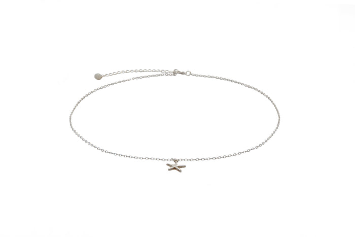 Starfish Charm Necklace, flat lay silver chain