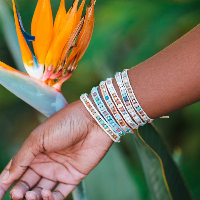 Sunrise Shack Healing Bracelet, stacked on wrist with flower