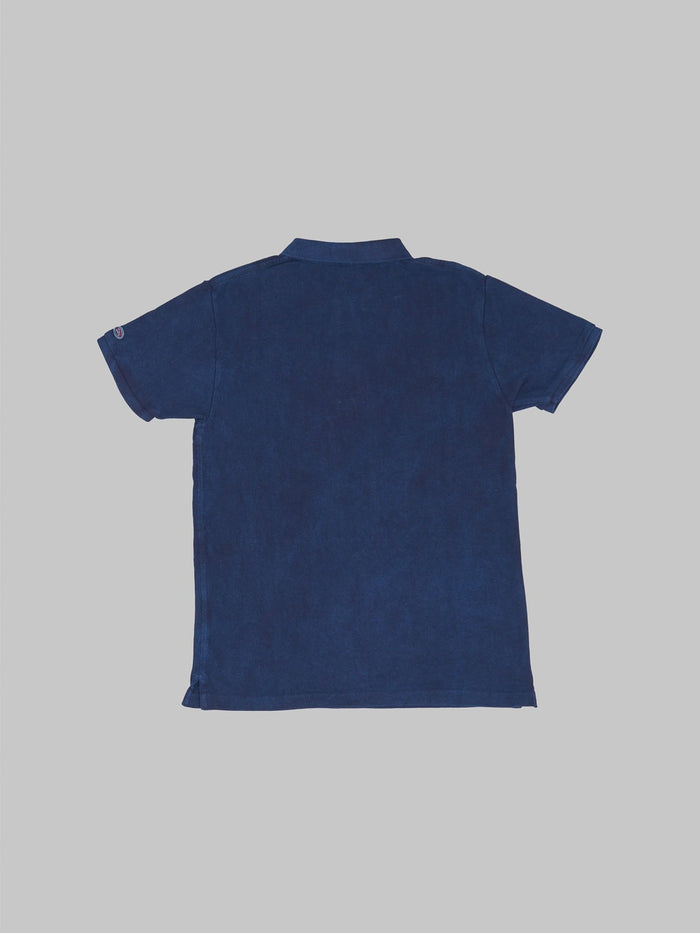 ues polo shirt indigo back view