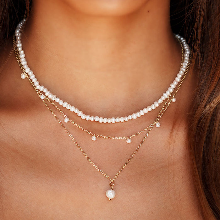 3mm Self Love Dewdrop Necklace, worn with layered necklaces
