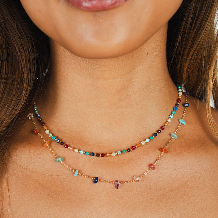 7 Chakras Raw Stone Chain Necklace, layered on the neck