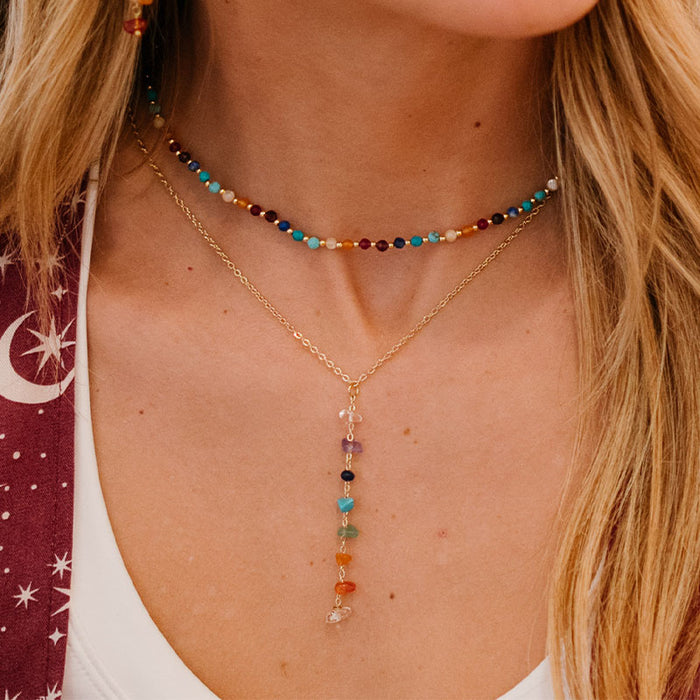 7 Chakras Raw Stone Healing Necklace, layered on neck
