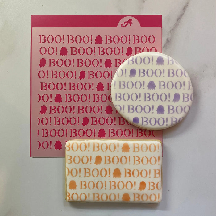 This Boo Ghosts Pattern Cookie Stencil is shown airbrushed on a circle cookie in purple and on a rectangle cookie in orange