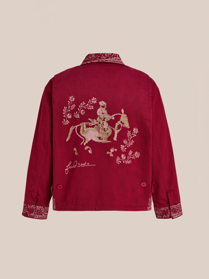 The Found Abhala Printed Work Jacket is a unisex relaxed fit in red, with equestrian motifs and a floral horse rider illustration on the back, embroidered cuffs, and a signature below the artwork.