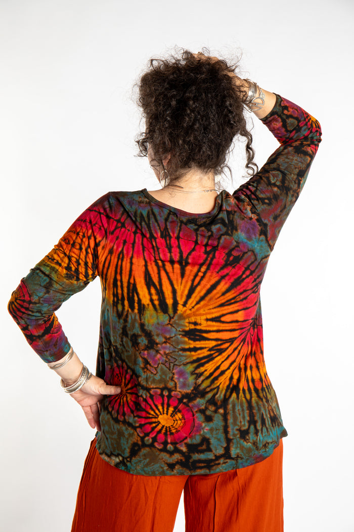 Susan wearing the black rainbow tie dye long sleeve shirt