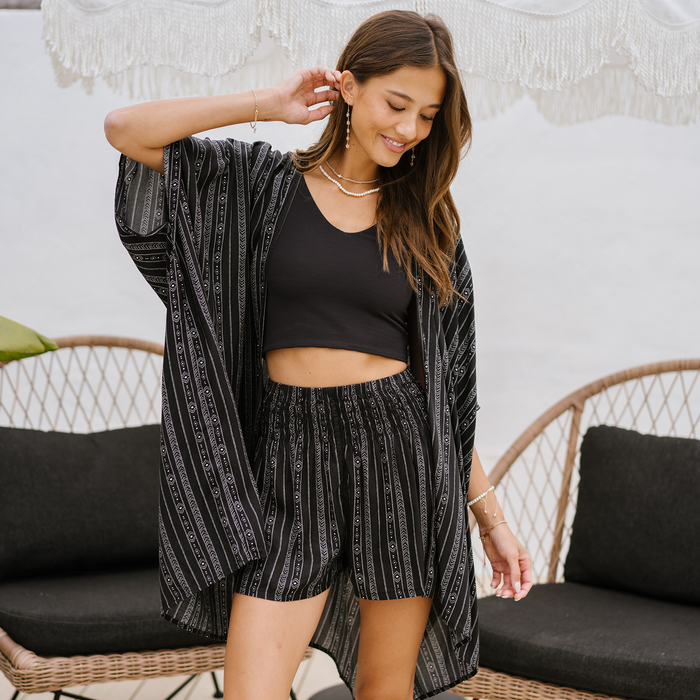 Akha Tribal Print Kimono, worn on the patio