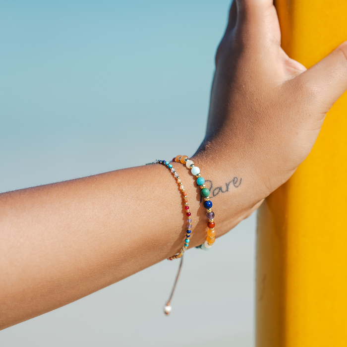 Aloha State of Mind 4mm Healing Bracelet, on wrist at the beach