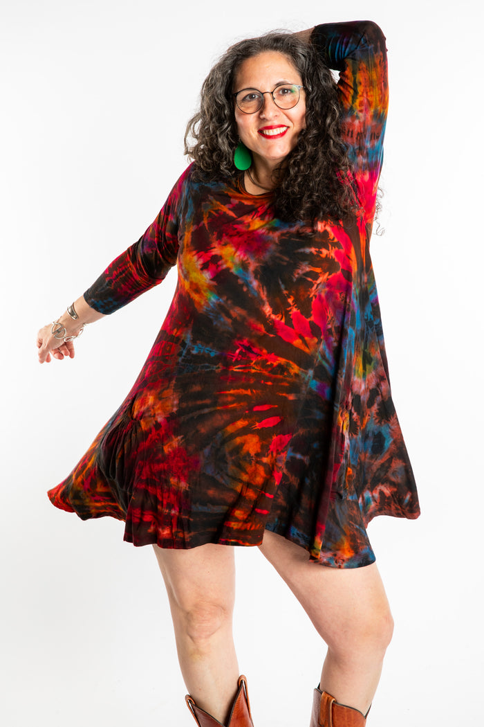Susan wearing a long sleeve tie dye dress in the color Brown