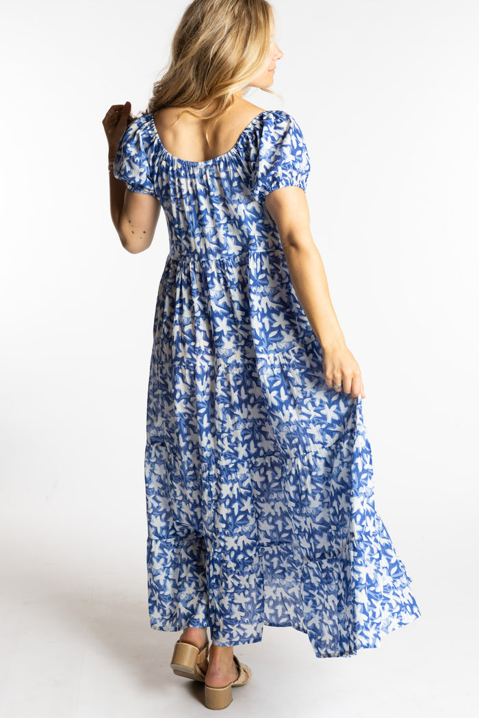 Sophie is wearing the size S/M Blue floral Amara Cotton Maxi Dress
