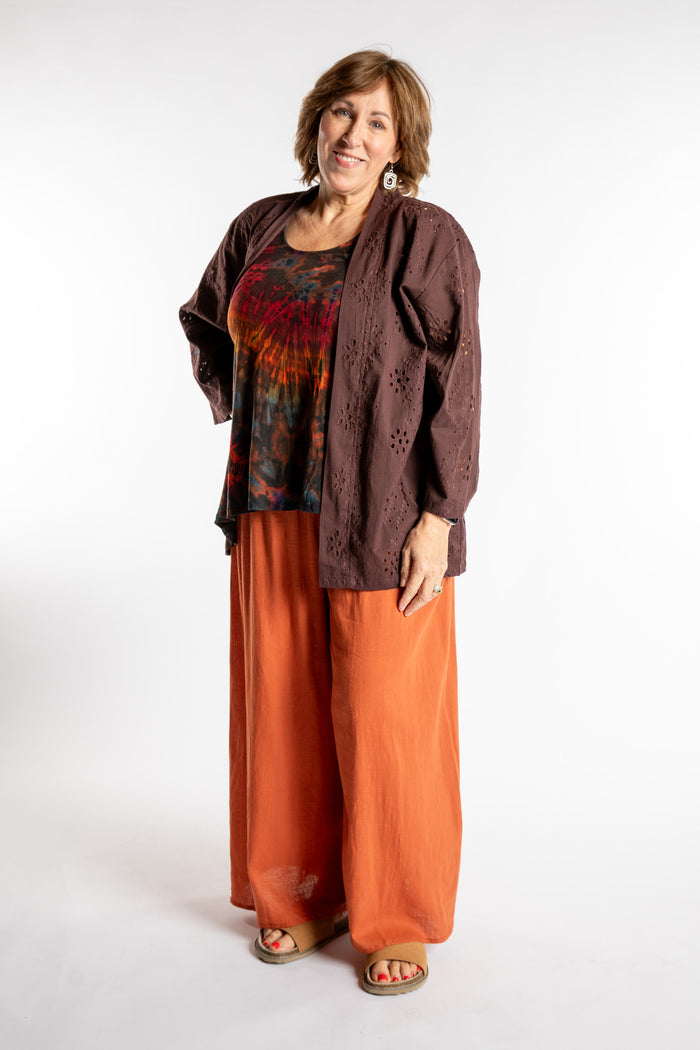 Betty is wearing the one size Anandi cardigan in Brown