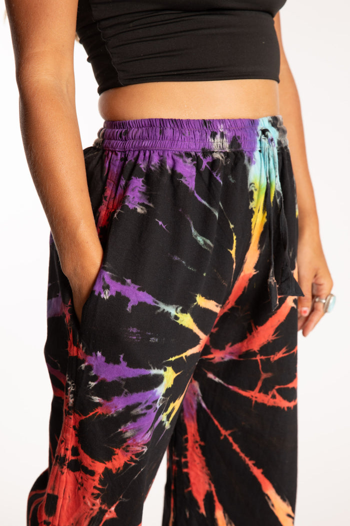 Sophie is wearing the Rainbow Anika Tie Dye Jogger Pants in S/M