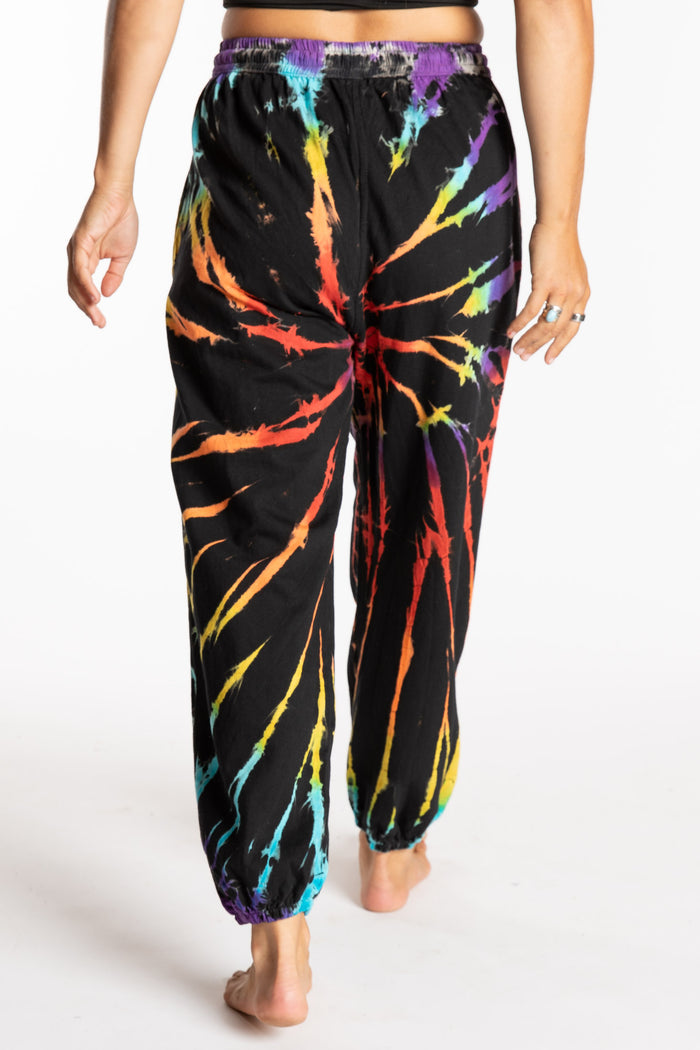 Sophie is wearing the Rainbow Anika Tie Dye Jogger Pants in S/M