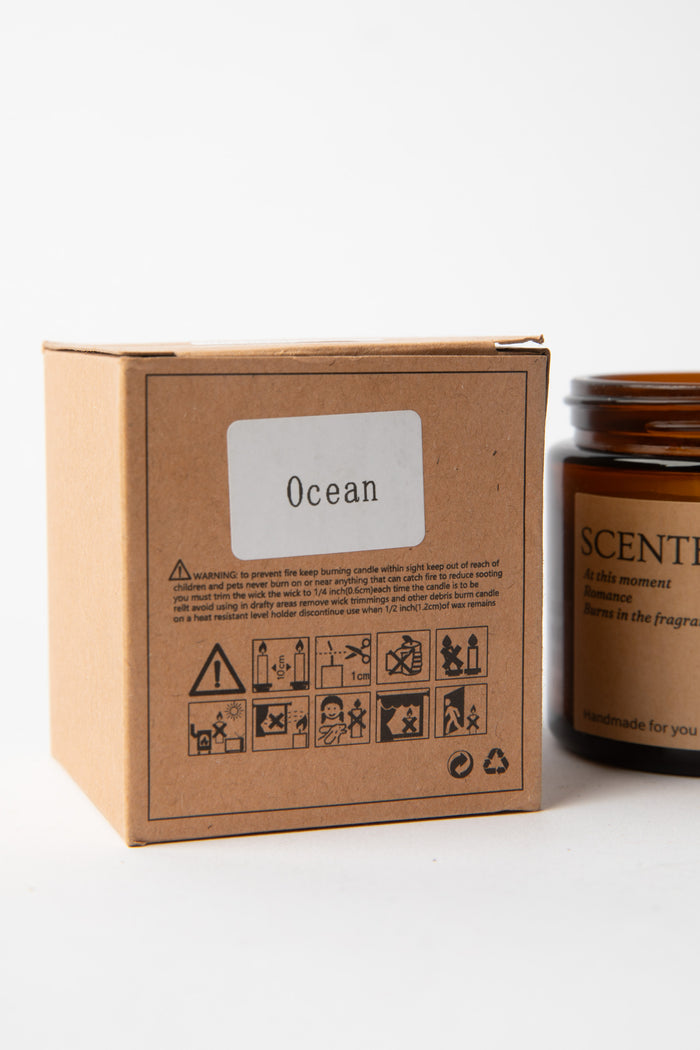 Ocean Apothecary Jar Candle box label with amber glass jar and black lid