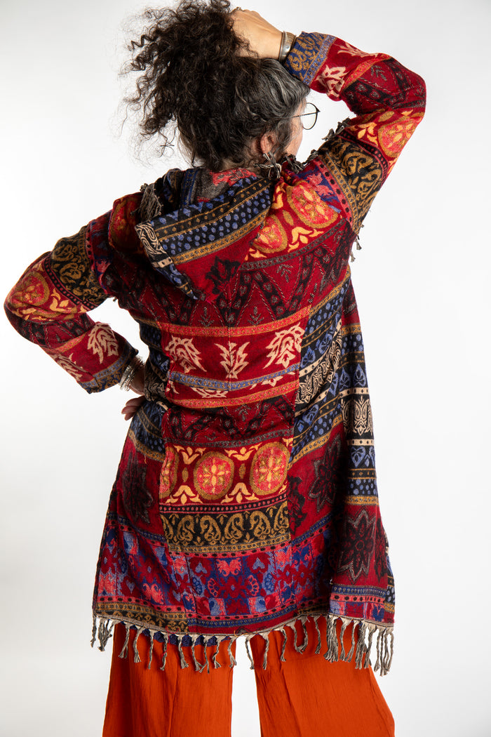 Susan wearing the Red multicolored patterned blanket jacket
