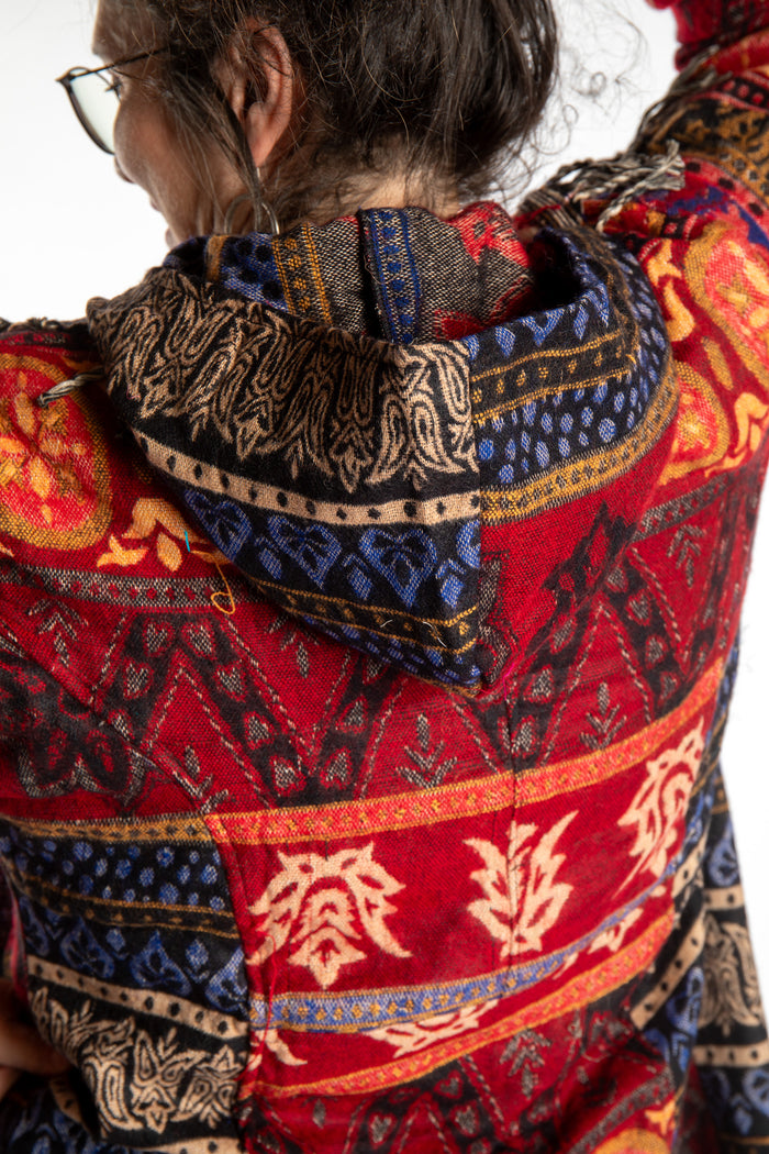 Susan wearing the Red multicolored patterned blanket jacket