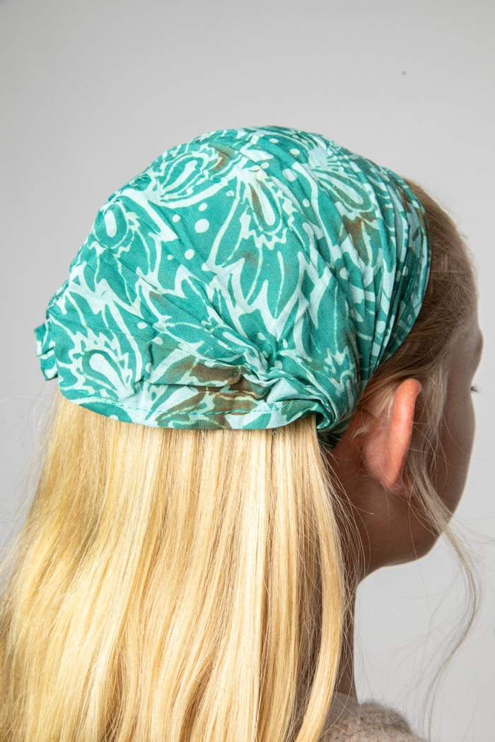 Talia wearing a Green batik one of a kind headband