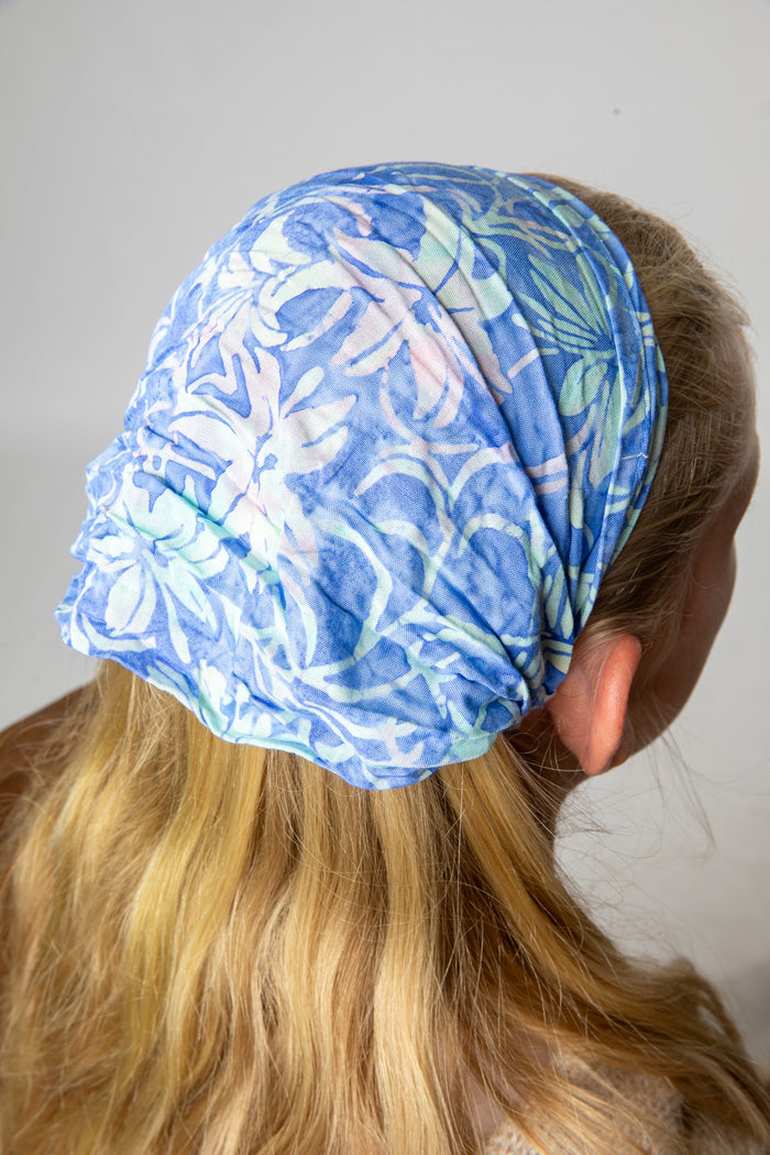 Talia wearing a Light Blue batik one of a kind headband