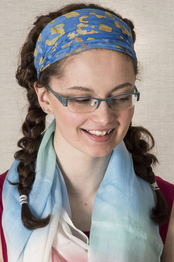 Sarah wearing a Light Blue batik one of a kind headband