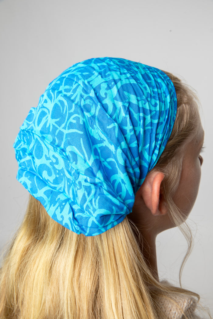 Talia wearing a Blue batik one of a kind headband