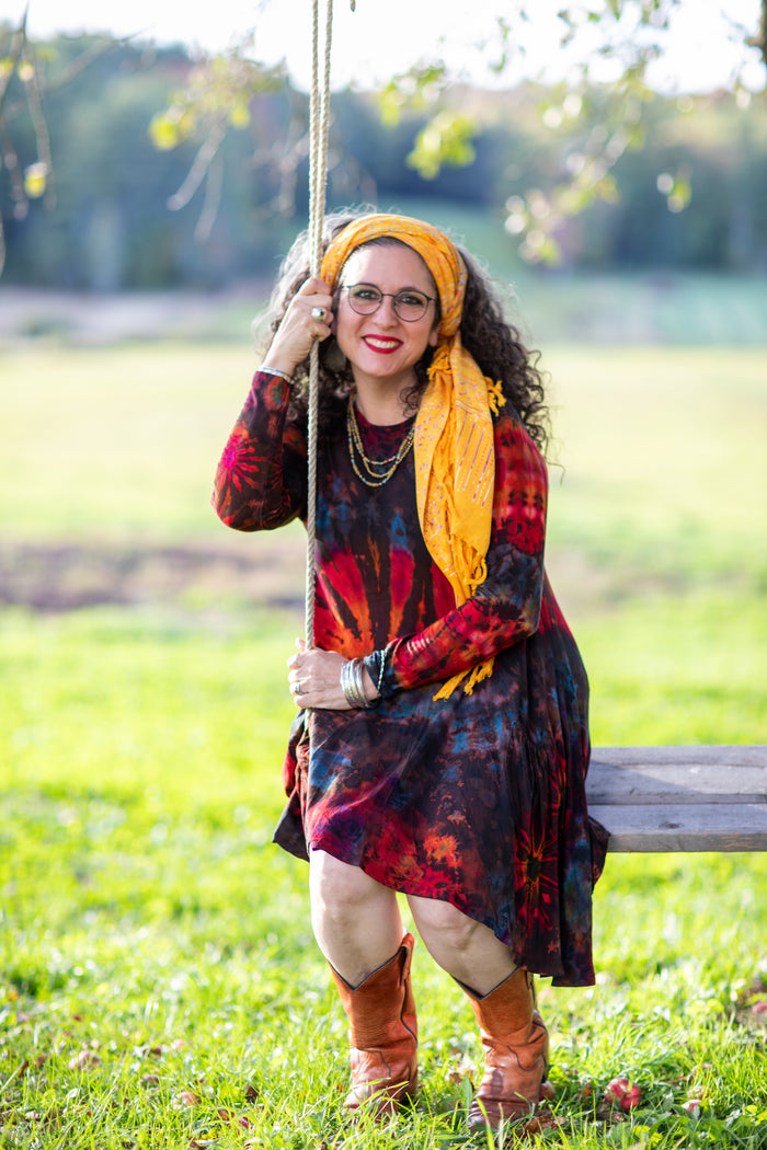 Susan wearing the sunlit shadows sarong and tie dye dress