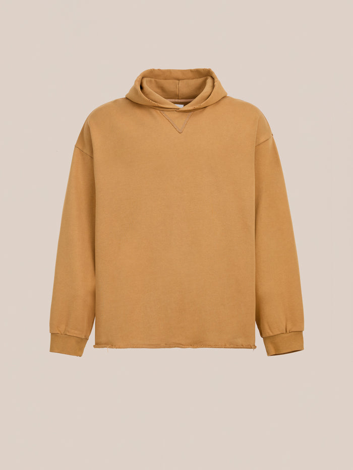 The FOUND Beadwork Logo Hoodie is a tan, long-sleeve vintage French terry cotton hoodie with ribbed cuffs and a relaxed fit, shown on a plain light background.
