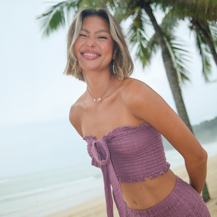 Berry Zanzibar Crop Top, worn leaning by palms