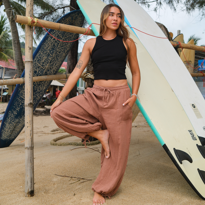 Black Cropped Rio Racerback Ribbed Tank, worn on the beach