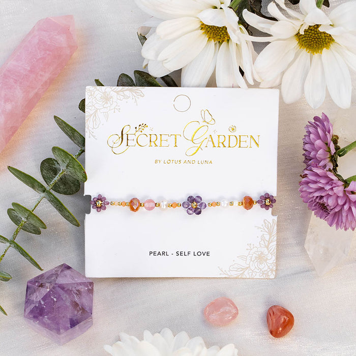 Blossoming Beauty Secret Garden Bracelet, on card with flowers