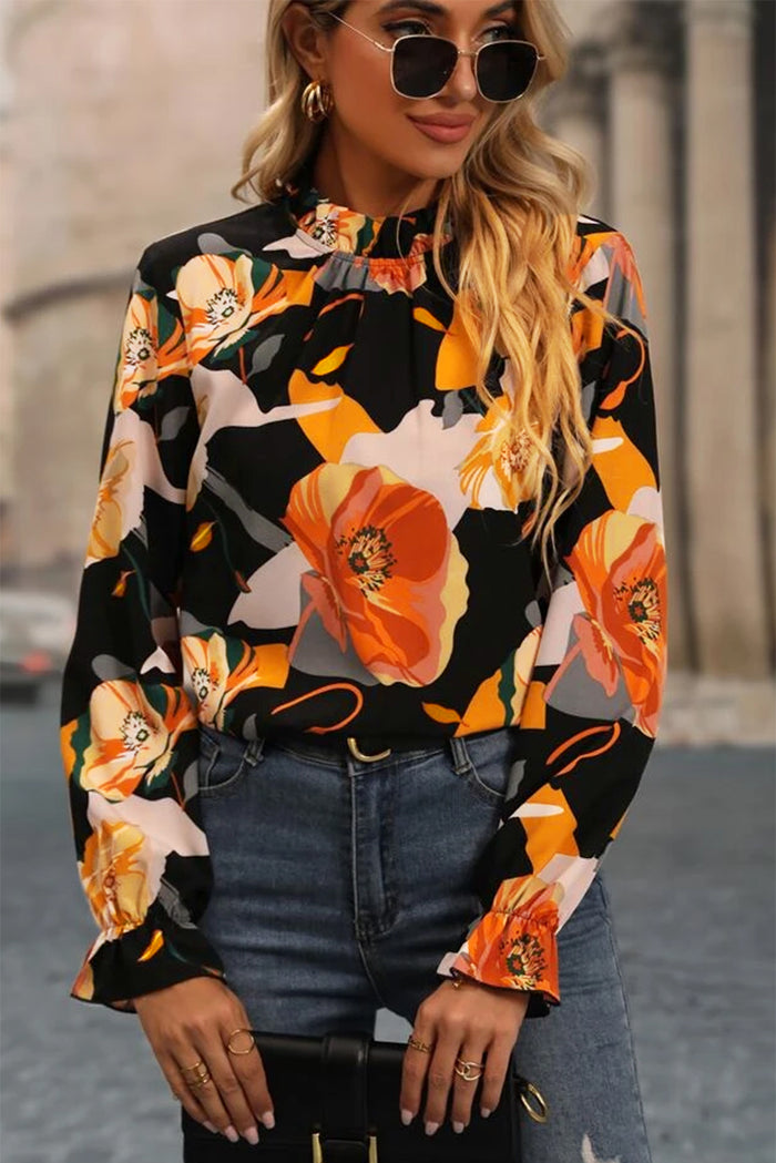 Blouse noire à col montant et imprimé floral-A WOMAN WE LOVE