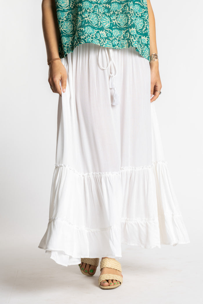 Sophie is wearing the Breezy Bliss Boho Prairie Skirt in white ivory