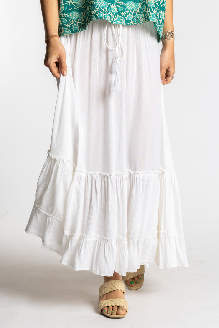 Sophie is wearing the Breezy Bliss Boho Prairie Skirt in white ivory