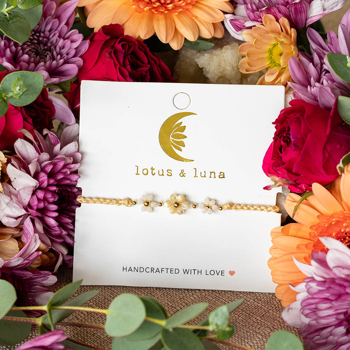 Buttercup Garden Party Bracelet, flat lay on card with flowers