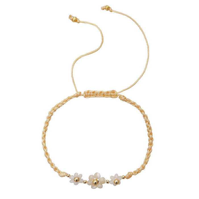 Buttercup Garden Party Bracelet, flat lay adjustable cord