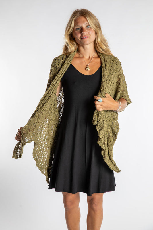 Sophie is wear the Cascade Loose Weave Cardigan in Olive