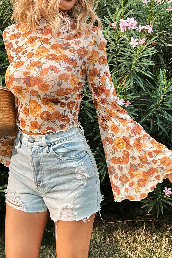 Chemisier orange à imprimé floral et manches cloche, col montant, bordure festonnée-A WOMAN WE LOVE
