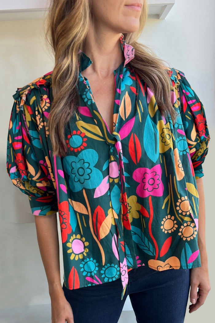 Chemisier vert à imprimé floral, manches bouffantes, noué à col en V-A WOMAN WE LOVE