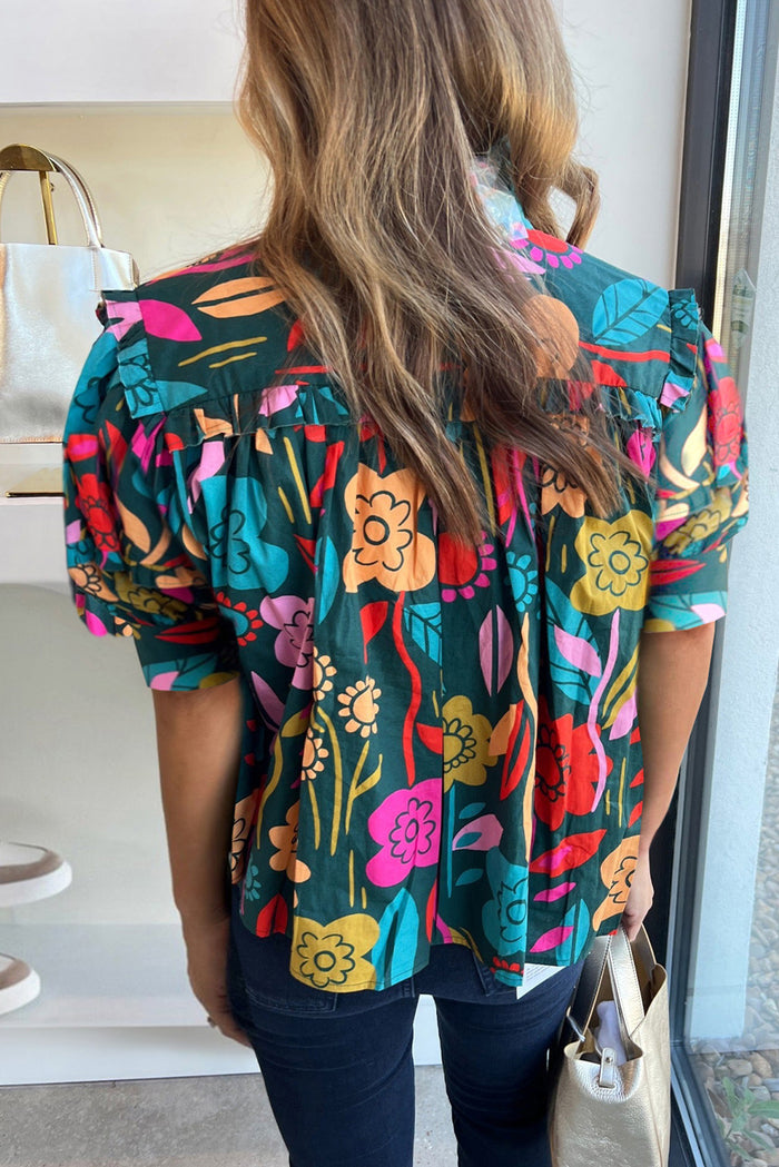 Chemisier vert à imprimé floral, manches bouffantes, noué à col en V-A WOMAN WE LOVE