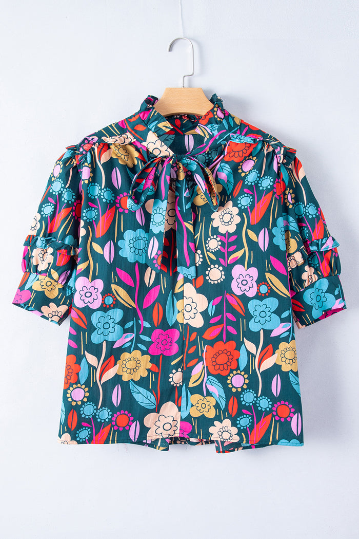 Chemisier vert à imprimé floral, manches bouffantes, noué à col en V-A WOMAN WE LOVE
