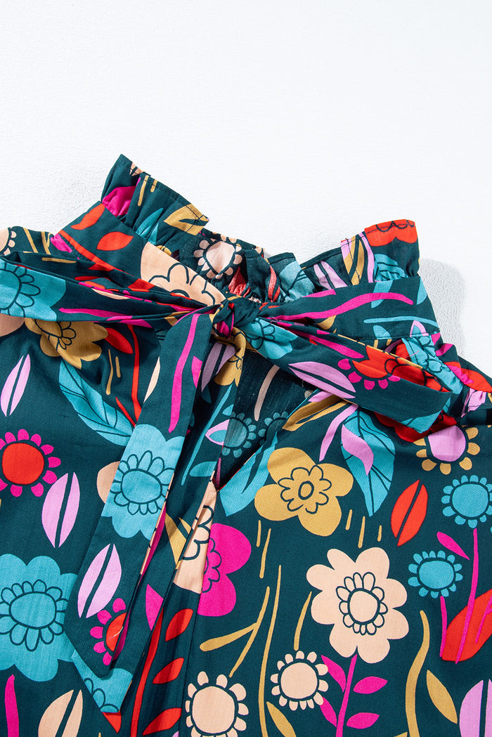 Chemisier vert à imprimé floral, manches bouffantes, noué à col en V-A WOMAN WE LOVE