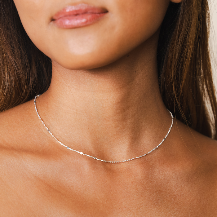 Circles in the Sand Necklace, silver chain on neck