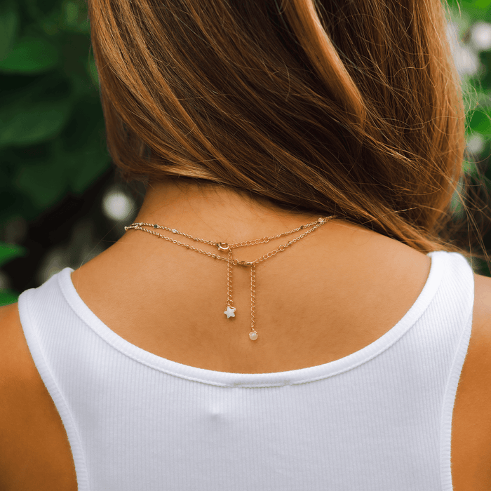 The back clasps of two necklaces