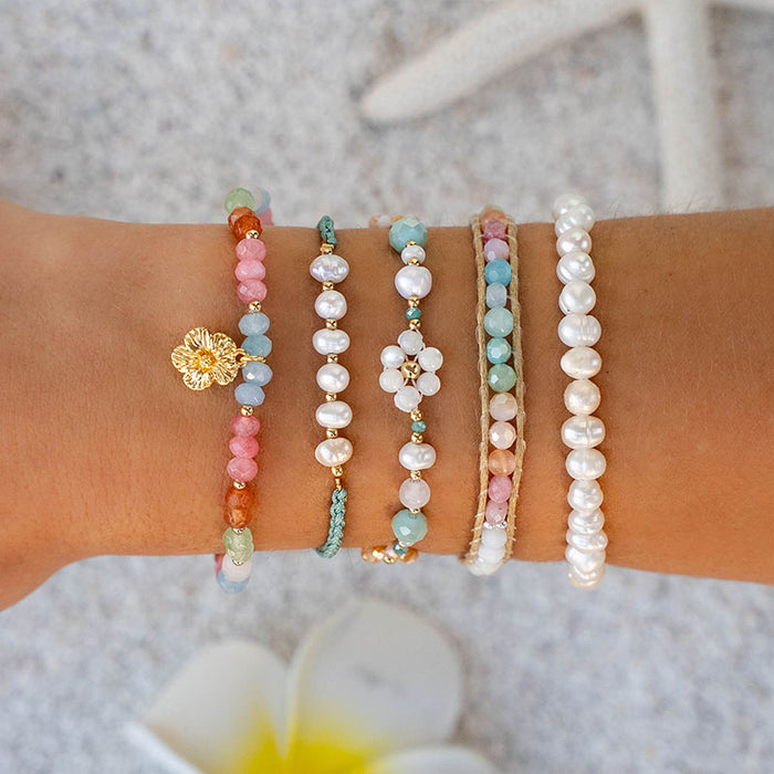 Coconut Crush Healing Bracelet, stacked with pearl bracelets